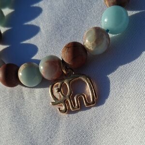 Elegant Beaded Bracelet with Elephant Charm